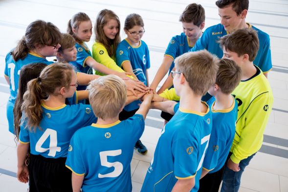 ... und können es kaum erwarten, die neuen Fünftklässler im Stützpunkt Handball begrüßen zu dürfen.